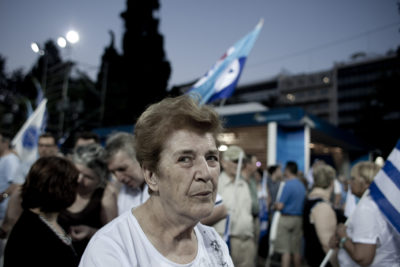 Elderly woman in Antonis Samaras, leader of Nea Dimocratia last election rally, in Syntagma square, on Friday 15th of June 2012, The 62-year-old’s New Democracy party achieved the highest percentage of votes in Sundays election, beating the radical left Syriza party into second place.